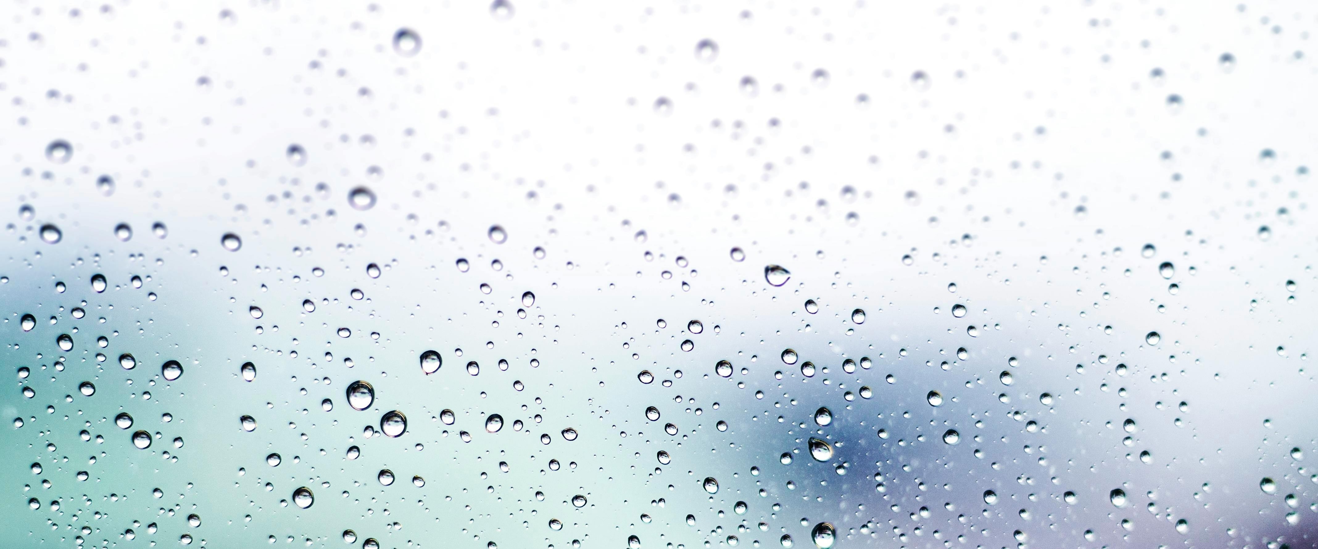 Water beads on glass.