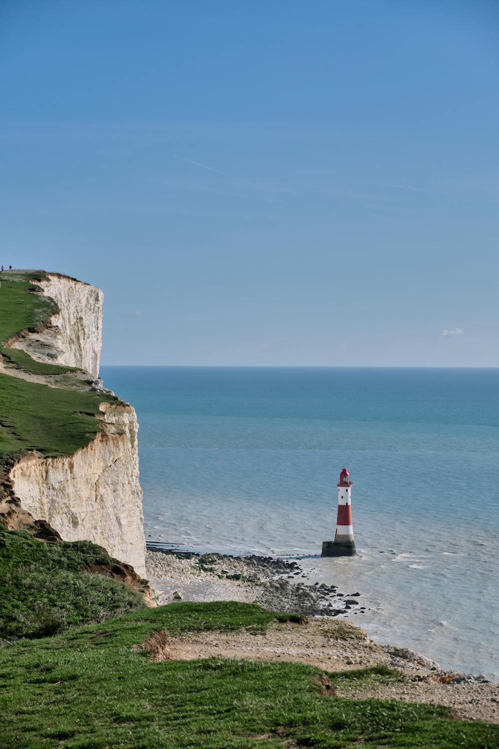 View of Beachy Head Lighthouse from cliffs near Eastbourne.