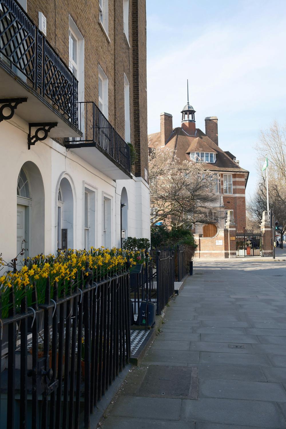 A London street with houses on the left.